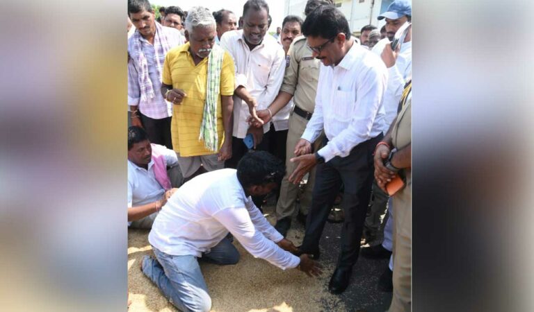 Another farmer falls at officer’s feet urging procurement of paddy in Mancherial